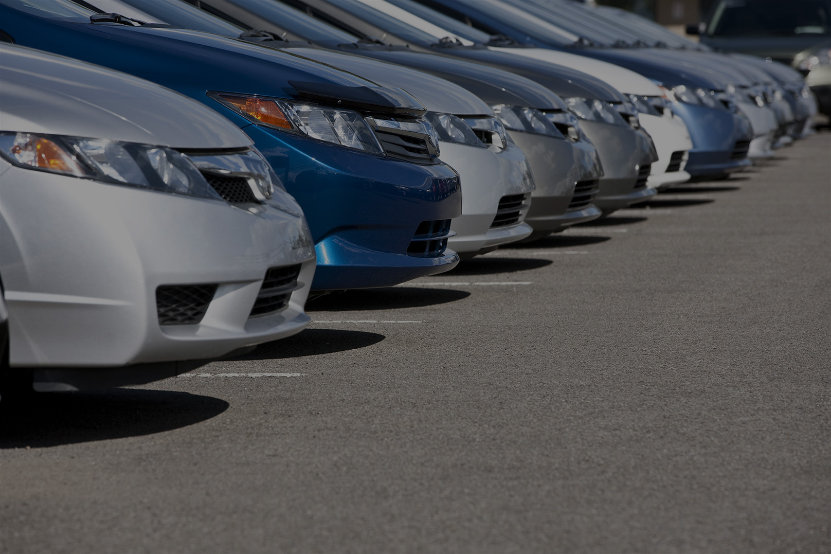 Line Of New Compact Cars At Dealership Dominion Dealer Solutions
